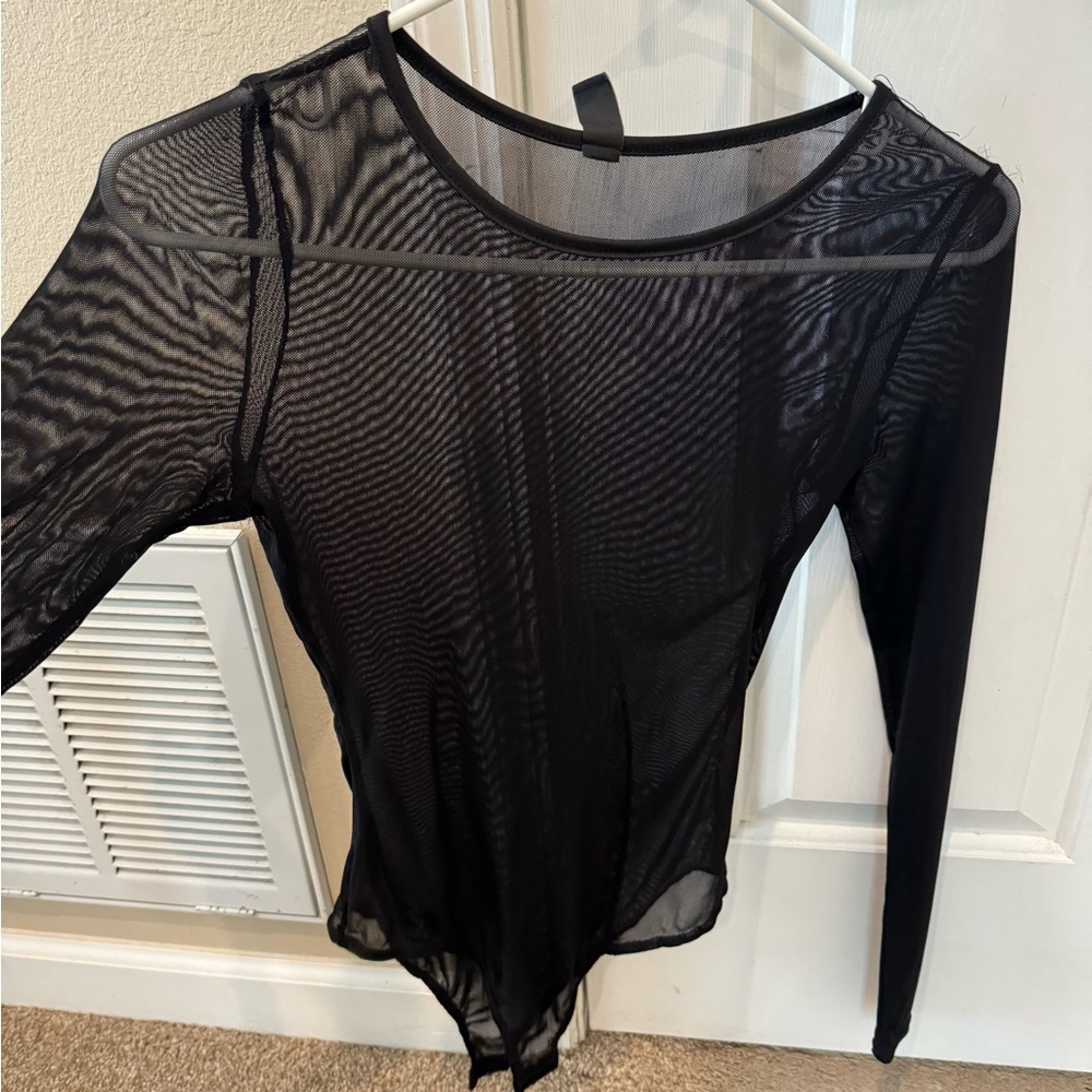 Bodysuit, looks really really good with a tank top or a bra top underneath